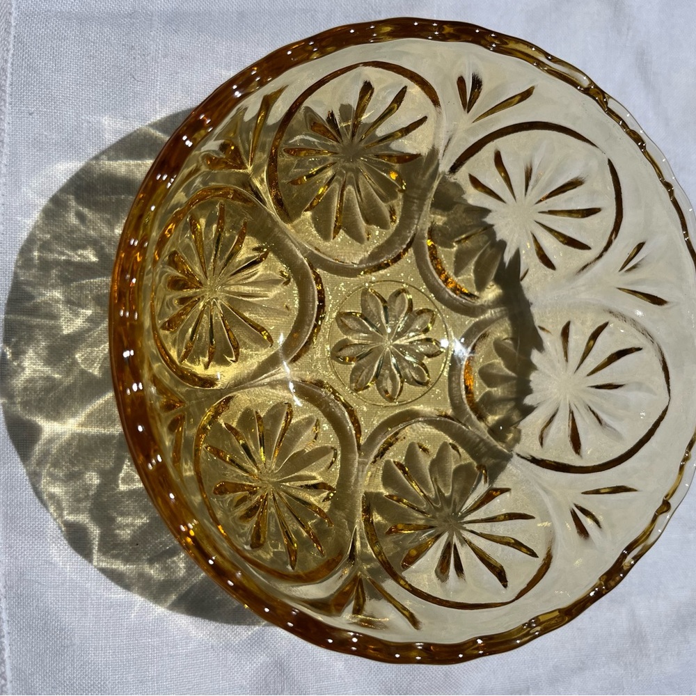 Indiana Amber Glass Small Bowl (4-3/8 diameter) Starburst Pattern -Scalloped Rim